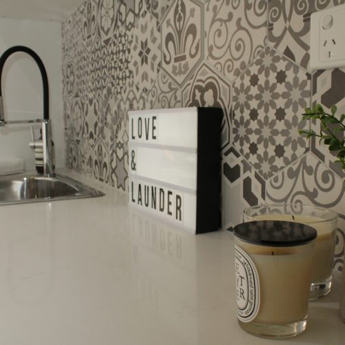 Laundry benchtop and splashback
