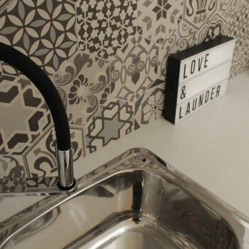 Laumdry trough and feature tile splashback