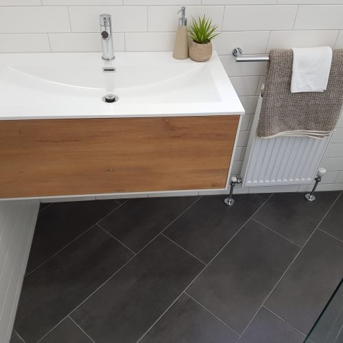 Wall hung vanity with inset basin