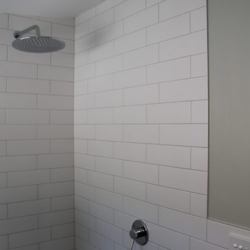 White subway tiles in walk in shower