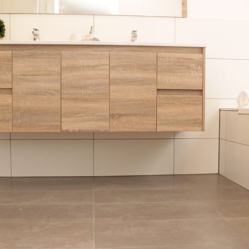 White wall tiles with double vanity