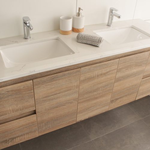 Double vanity with white stone top