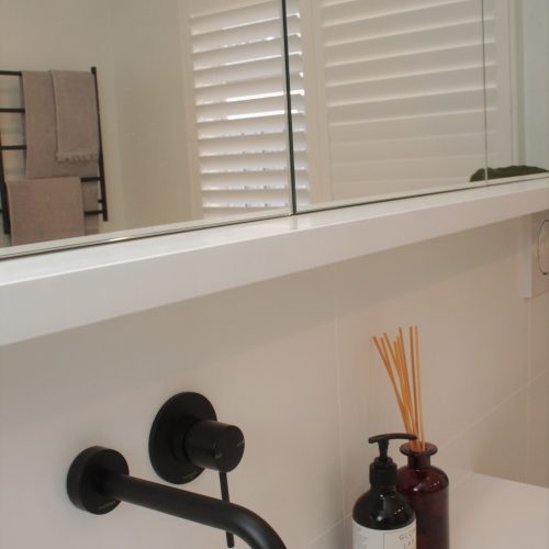 Matte black tapware with mirrors