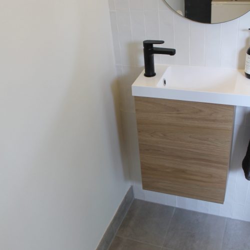 Small powder room ADP vanity with Pill Mirror