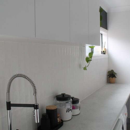 Timberline laundry wall cupboards, sink mixer and trough